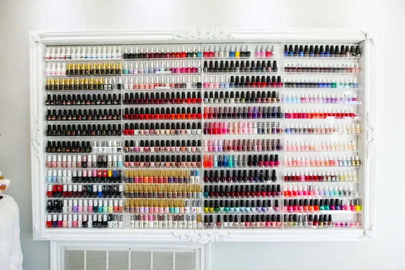 Wall display of nail polish colours